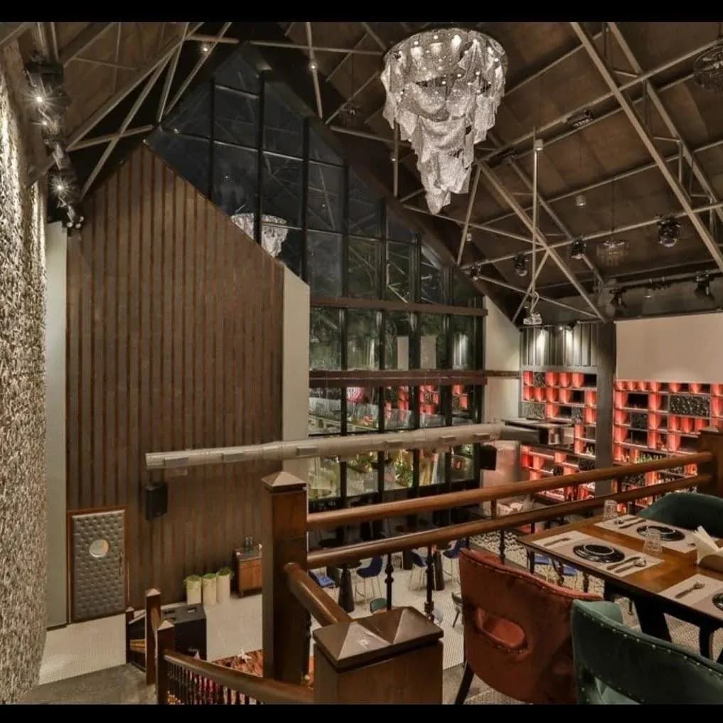 Restaurant interior with mezzanine seating designed on a Table & Fork project