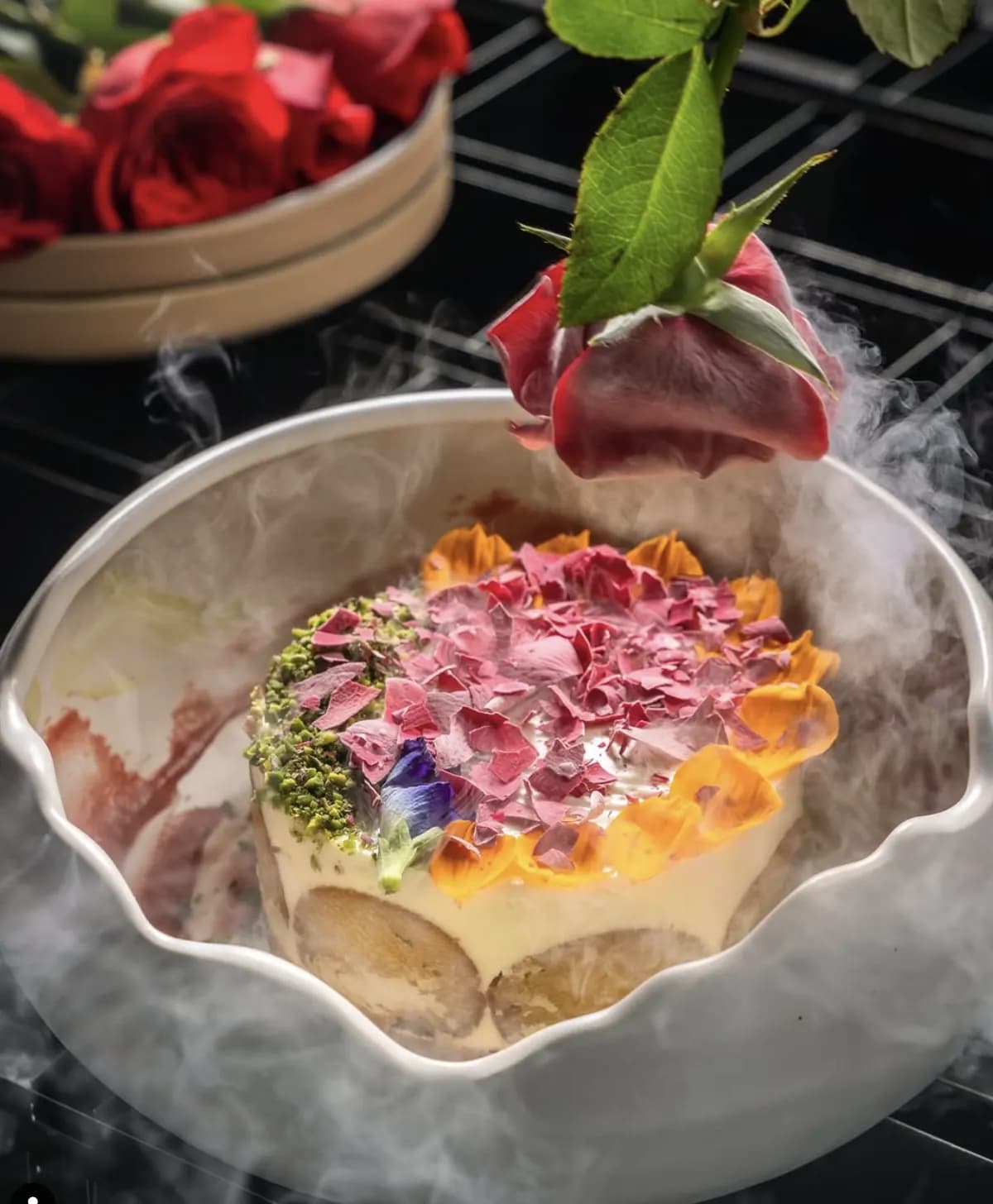 Smoked dish served in a ceramic bowl with dry ice presentation